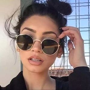Round / oval Sunglasses dark green lens gold frame